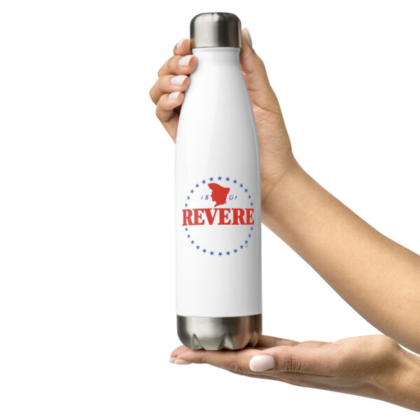 photo of hands holding a revere white water bottle