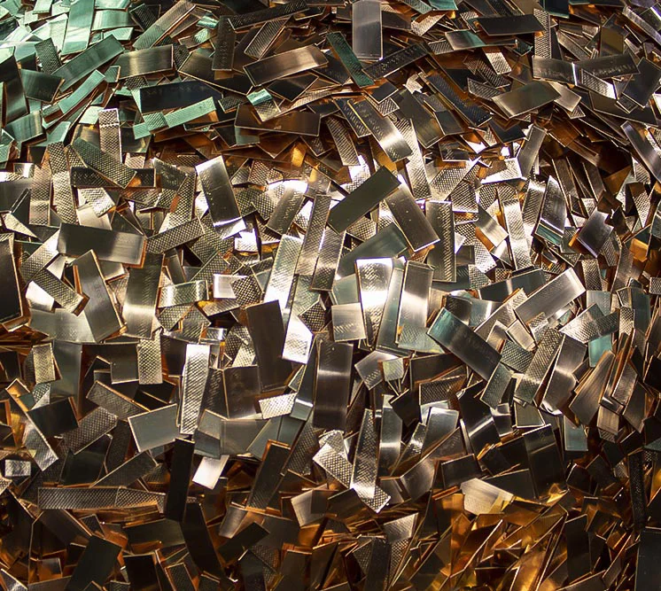 photo of copper pieces in a bin