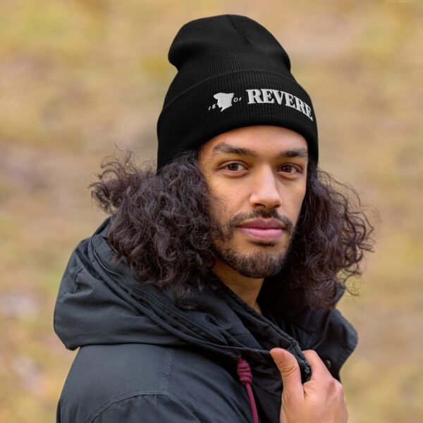 Man wearing black beanie with Revere 1801 embroidered graphic