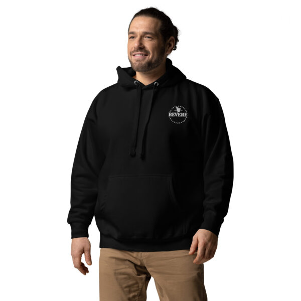 man wearing black hoodie with Revere logo