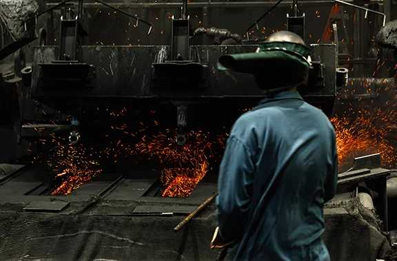 worker and hot copper